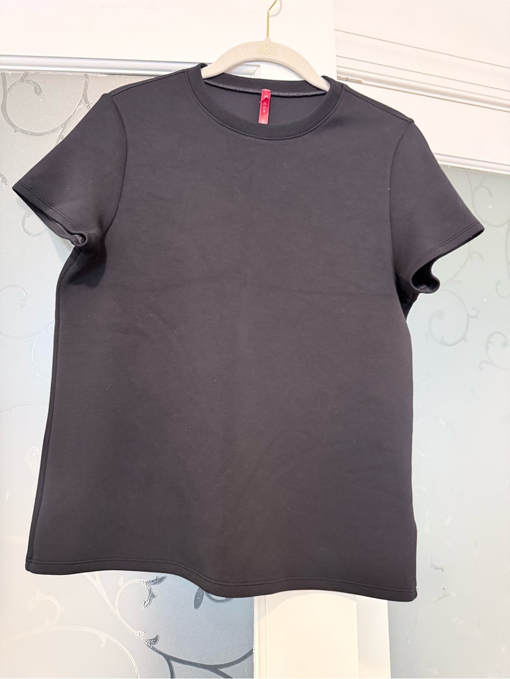 SPANX Black Short-Sleeve Crewneck Top.